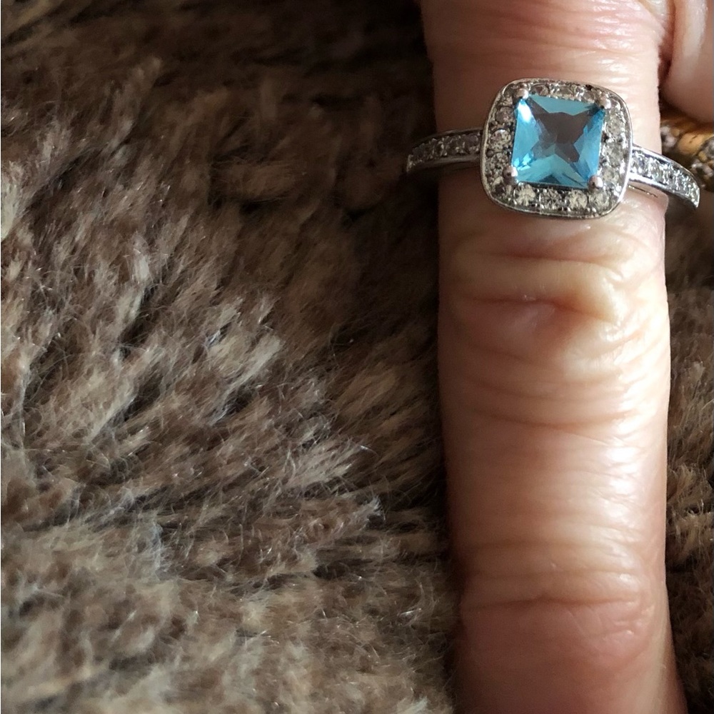 New sterling silver blue topaz ring with crystal hallo. Size 7